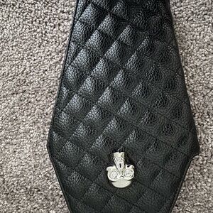 Black Quilted Leather Coffin Clutch with Silver Skull Accent